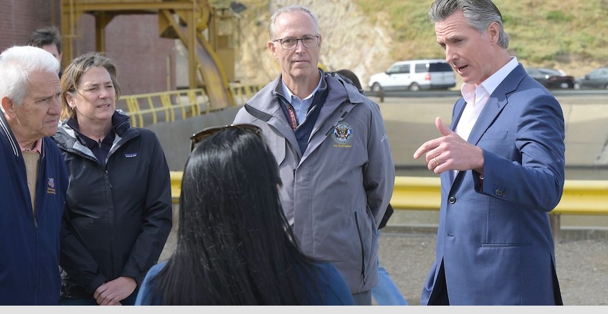 Gov. Gavin Newsom discusses upcoming federal and state solar projects with other officials.